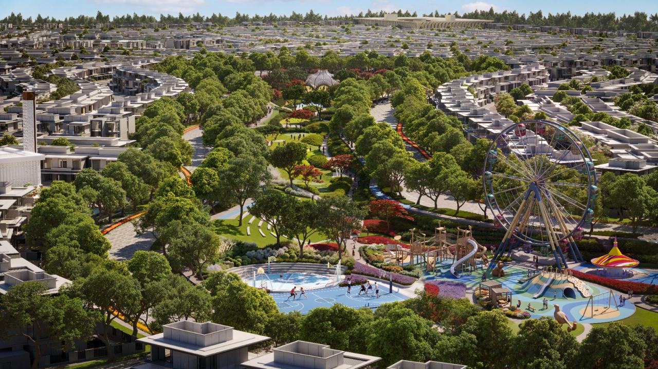 Azizi Florence Sharjah — the central park activity zone with observation wheel and play areas