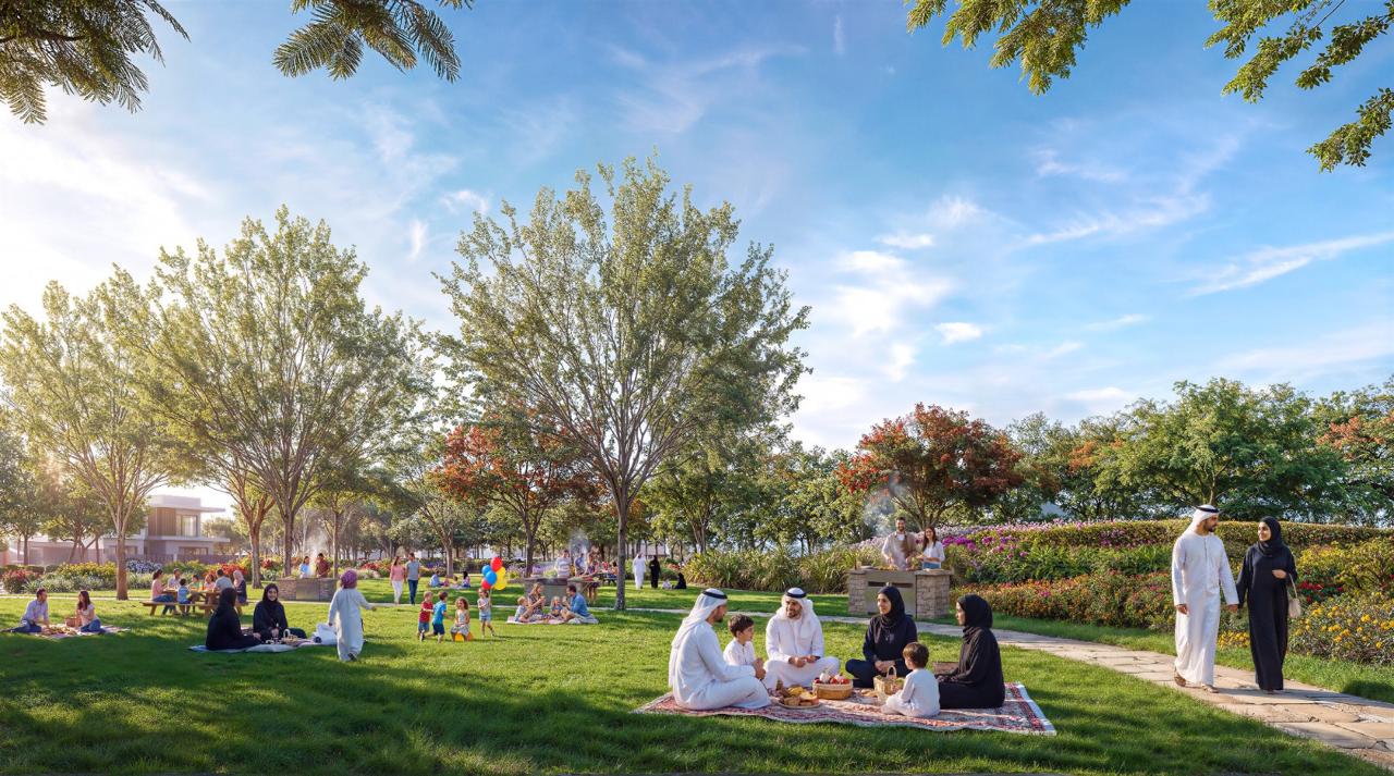 Azizi Florence Sharjah — families on the park picnic lawn