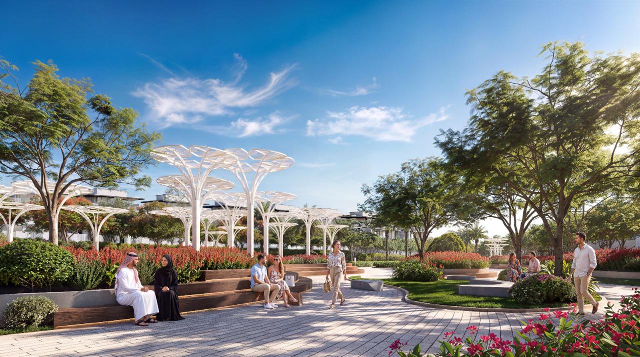 Azizi Florence Sharjah — the shaded plaza with canopy structures and seating