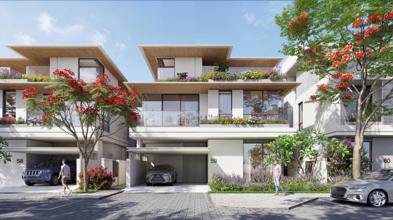 Azizi Florence Sharjah — a townhouse cluster street with timber roof canopies