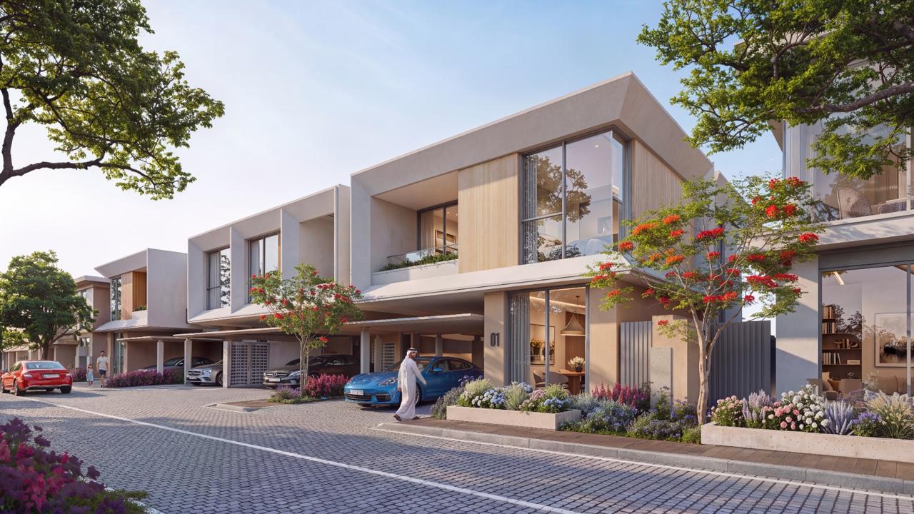Azizi Florence Sharjah — a townhouse streetscape in daylight