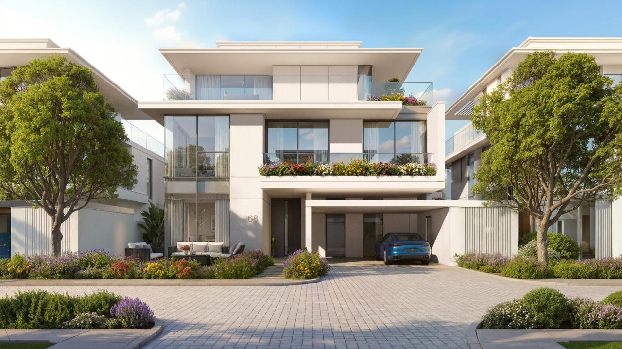 Azizi Florence Sharjah — a symmetrical villa frontage in daylight