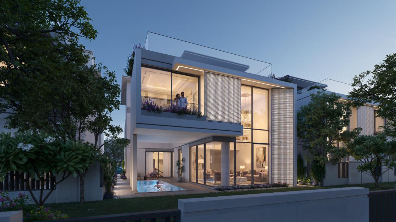 Azizi Florence Sharjah — a villa rear elevation at twilight